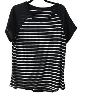 WEST Kei short sleeve t shirt with horizontal stripes and sheer sleeves.